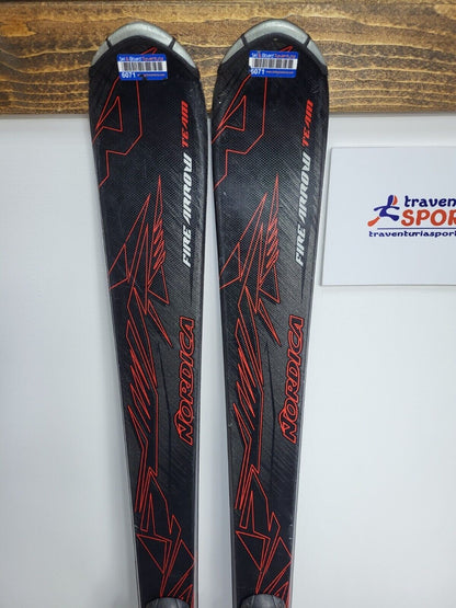 Ski Nordica Fire Arrow TM 140 cm + fixations Elan ESP 7.5, sports d’hiver